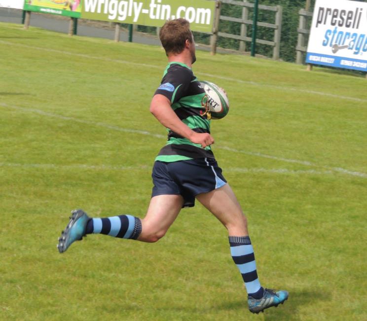 Ianto Griffiths races over for his third try